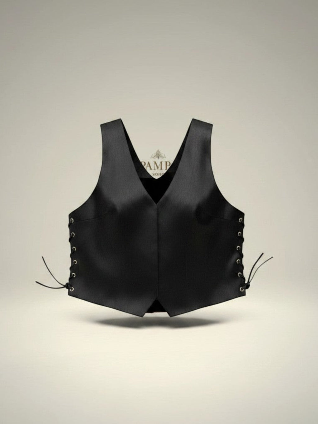 Top Elsie negro 100% piel de Pampa Boho, cruzado en la espalda con estoperoles y estrella.