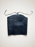 Top Pampa Boho de piel negra con remaches, espalda abierta y tiras ajustables. Unitalla.